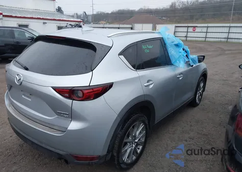2021 Mazda Cx-5 Grand Touring Reserve z USA, uszkodzony, nr VIN JM3KFBAY9M0434471